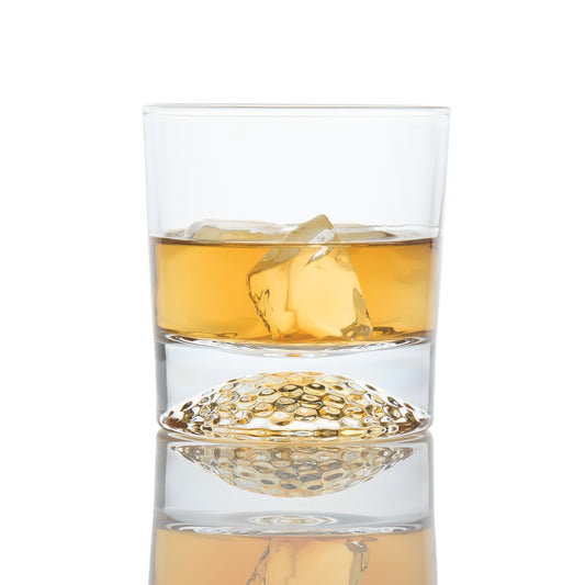 Premium golf ball base whiskey glass designed for golfers and whiskey lovers. Available as a single glass or gift set with accessories.
