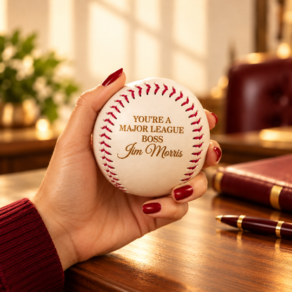 Woman presenting personalized baseball gift to her boss, thoughtful Boss's Day gift for baseball fans