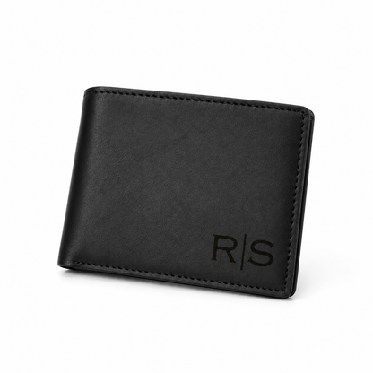 Personalized black leather bifold wallet with custom monogram engraving The lighthouse goods Personalized black leather bifold wallet for men RS monogram engraving on the lower right corner, photographed on a clean white background. The lighthouse goods