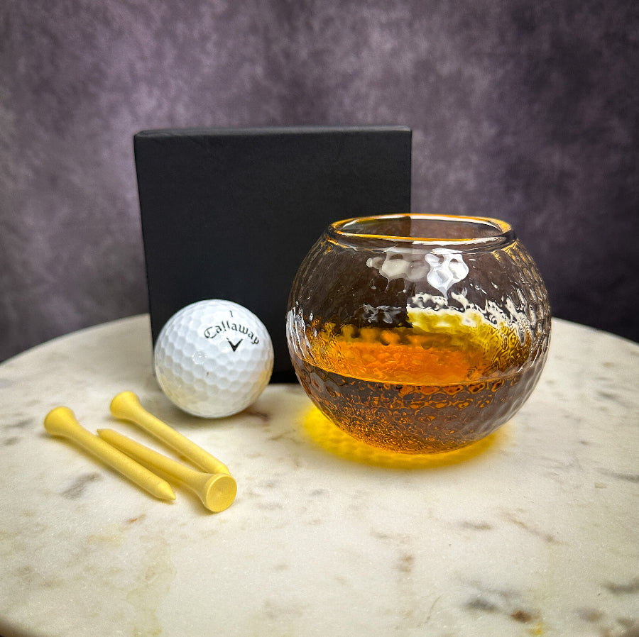 Personalized golf ball shape whiskey glass gift set with golf ball and tees, perfect for golf-loving men