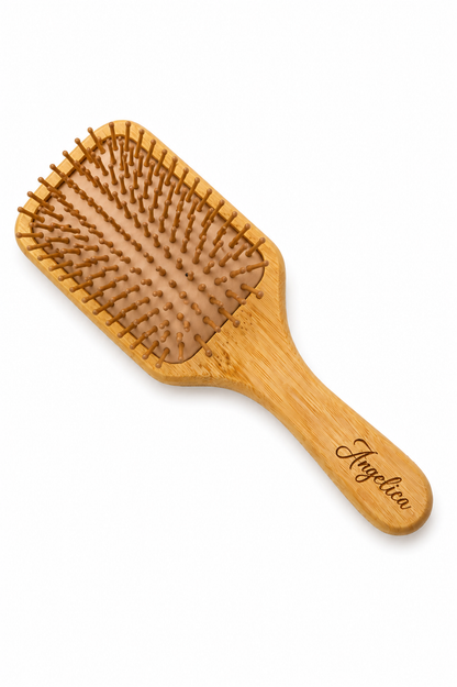 Engraved bamboo hair brush made from natural wood, personalized paddle brush for everyday hair care and gentle scalp massage.