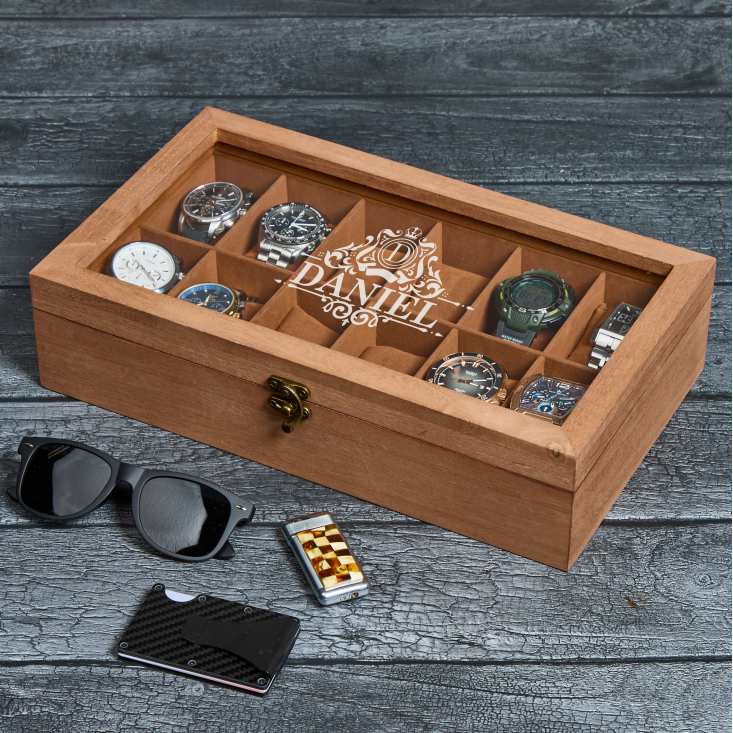Personalized watch box featuring monogram initials and solid wood design
Wooden watch box with custom engraving, soft pillows, and glass display lid